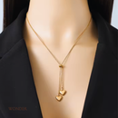 Colar Maria, aço inoxidável, dourado, ajustável de pigente de coração.