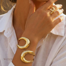 Conjunto Nora, dourado, minimalista, geométrico.