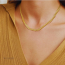 Conjunto Paola, aço inoxidável, cor de ouro trigo, corrente colar e pulseira.