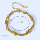 Pulseira Bruna, de aço inoxidável, dourada, corrente enrolada.