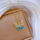 Conjunto Clara, aço inoxidável, azul cristal oco borboleta,  colar e brinco.