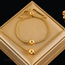 Conjunto Francisca, aço inoxidável, dourado, grânulo bola, colar e pulseira.
