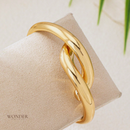 Pulseira Maristela, dourado, geométrico e assimétrico.