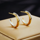 Brinco Diana, aço inoxidável, dourado e prata.