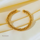 Pulseira Andressa, aço inoxidável, cor de ouro, torcido, ajustável, à prova da água.