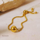 Conjunto Francisca, aço inoxidável, cor de ouro, grânulo bola, colar e pulseira.