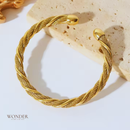 Pulseira Andressa, aço inoxidável, cor de ouro, torcido, ajustável, à prova da água.
