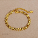 Conjunto Paola, aço inoxidável, cor de ouro trigo, corrente colar e pulseira.