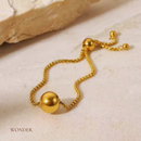 Conjunto Francisca, aço inoxidável, dourado, grânulo bola, colar e pulseira.